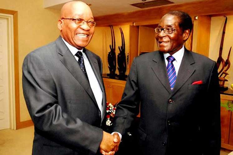 Presidentes Jacob Zuma y Robert Mugabe