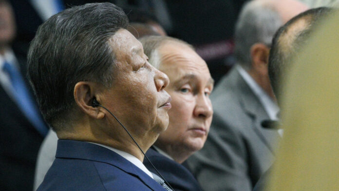 Xi Jinping y Vladimir Putin. Xinhua